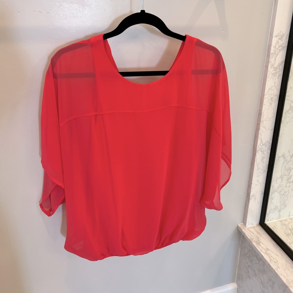 Express blouse in size M